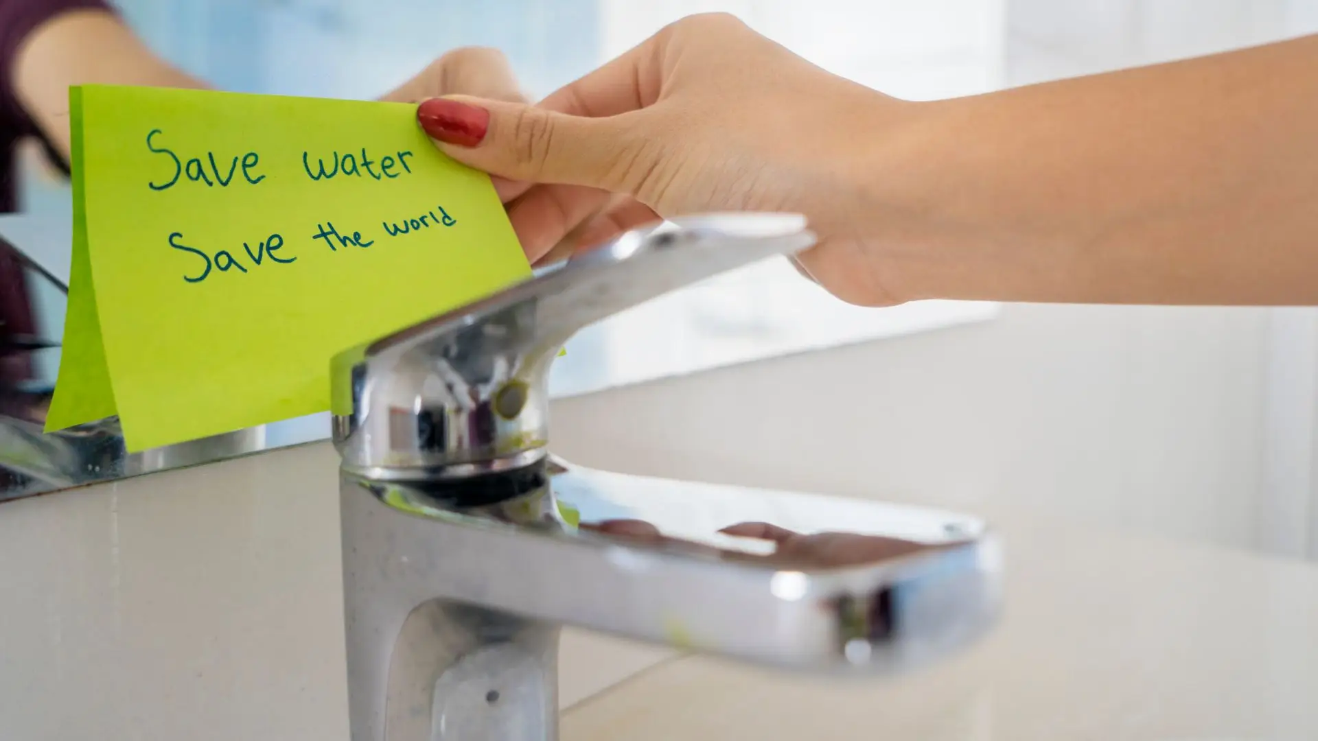 An image illustrating water conservation and sustainable living, featuring a dripping faucet