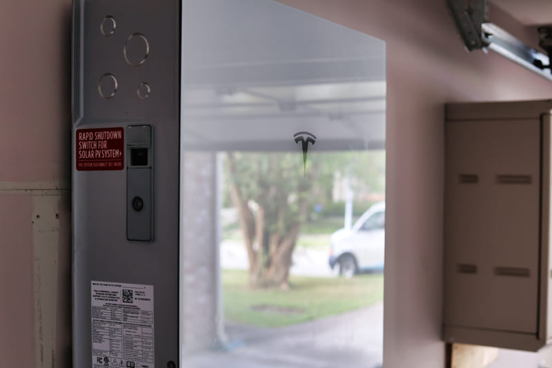 Image of a Tesla Powerwall battery system installed by the Solstice Solar team, accompanying the blog "How Long Will a Tesla Powerwall Last?"